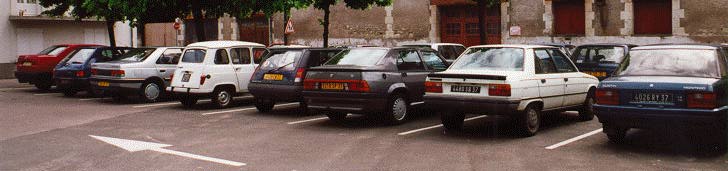 Several cars in a row, all of which have license
plates ending in 37